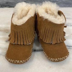 UGG infant fringe boots. Velcro closure.